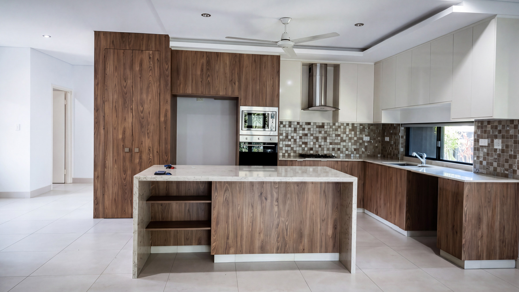 The kitchen at 23 Crosby Street in the listing photo, empty